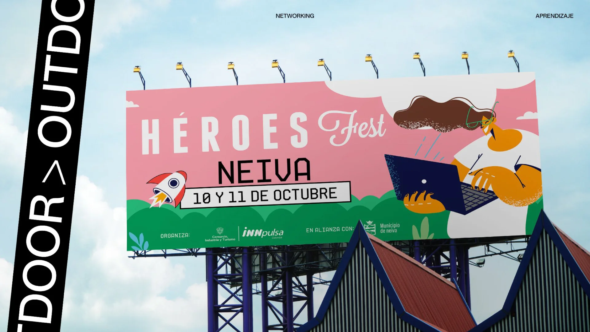 Valla de Héroes Fest en Neiva con la ilustración del festival